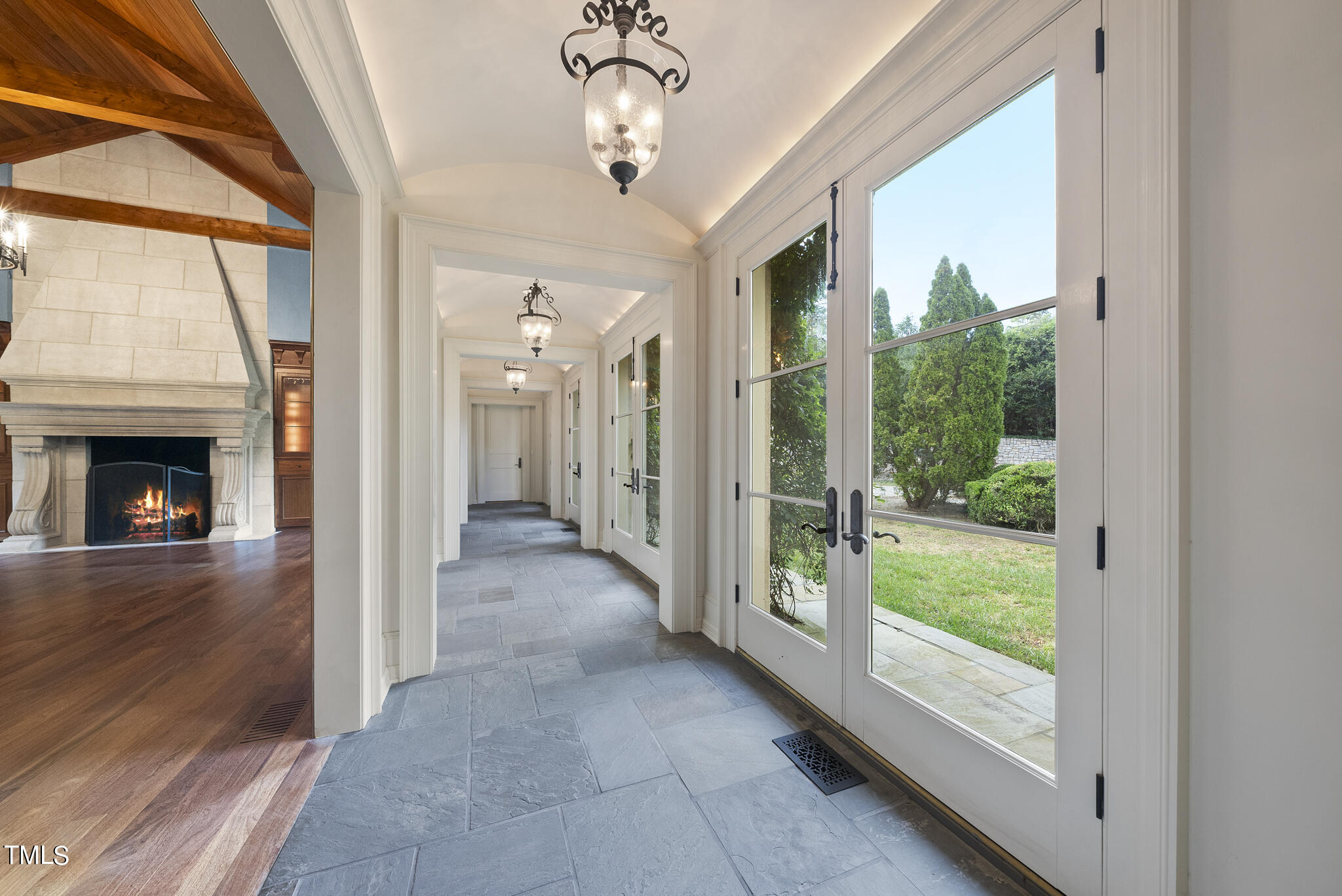 3319 White Oak Road Raleigh, NC 27609 - Photo 11 of 47 a view of a livingroom with wooden floor staircase and a kitchen