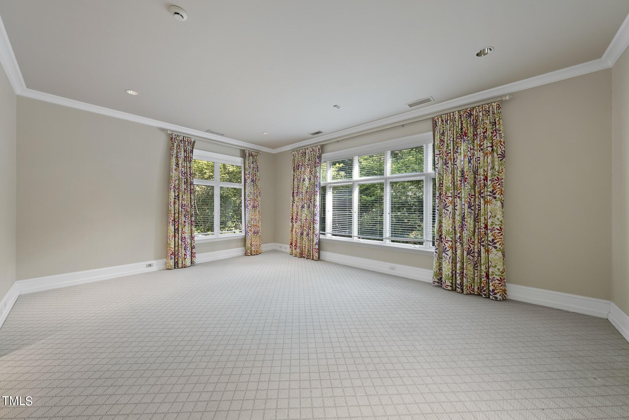 3319 White Oak Road Raleigh, NC 27609 - Photo 25 of 47 a view of an empty room with a window