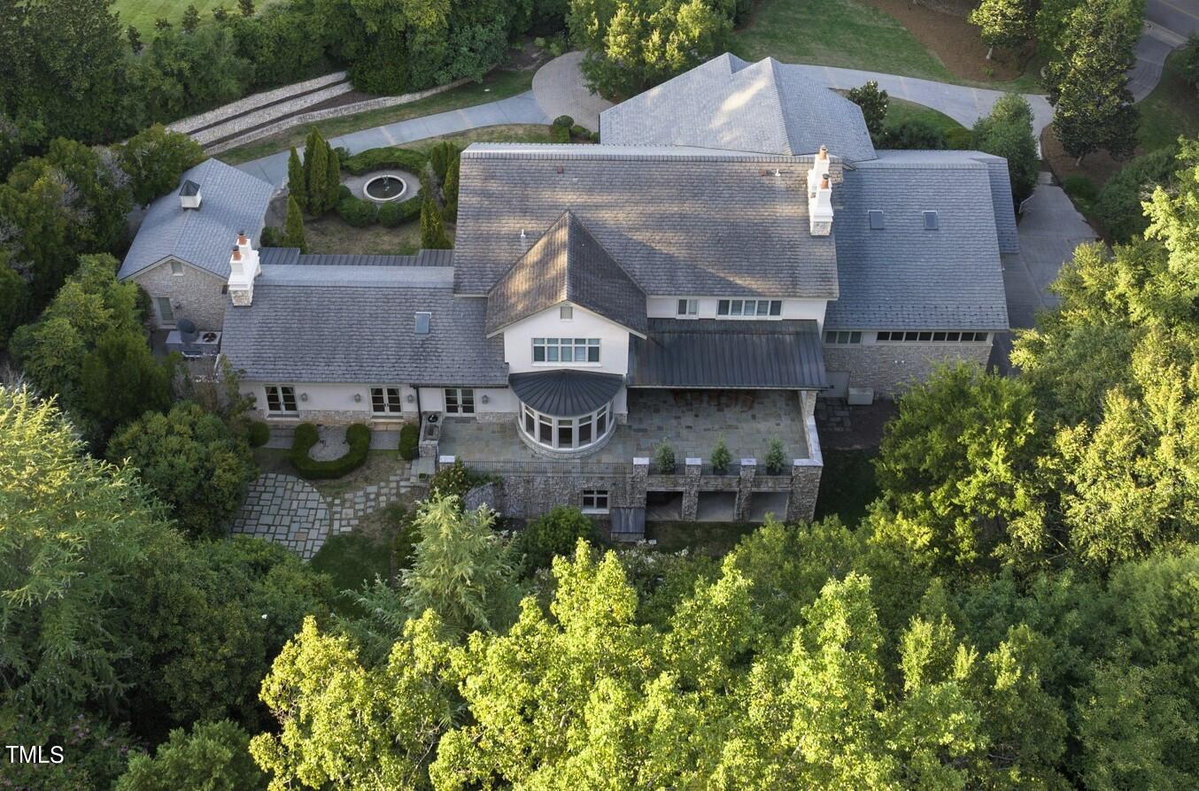 3319 White Oak Road Raleigh, NC 27609 - Photo 3 of 47 an aerial view of a house with a garden