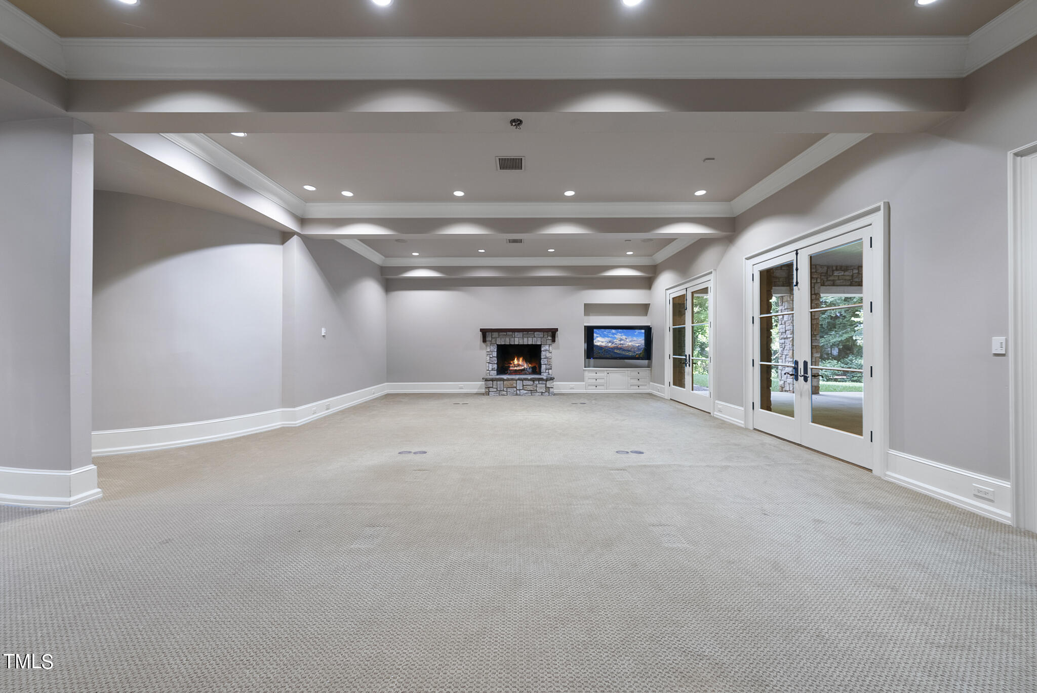 3319 White Oak Road Raleigh, NC 27609 - Photo 40 of 47 a view of a big room with windows and a cabinet