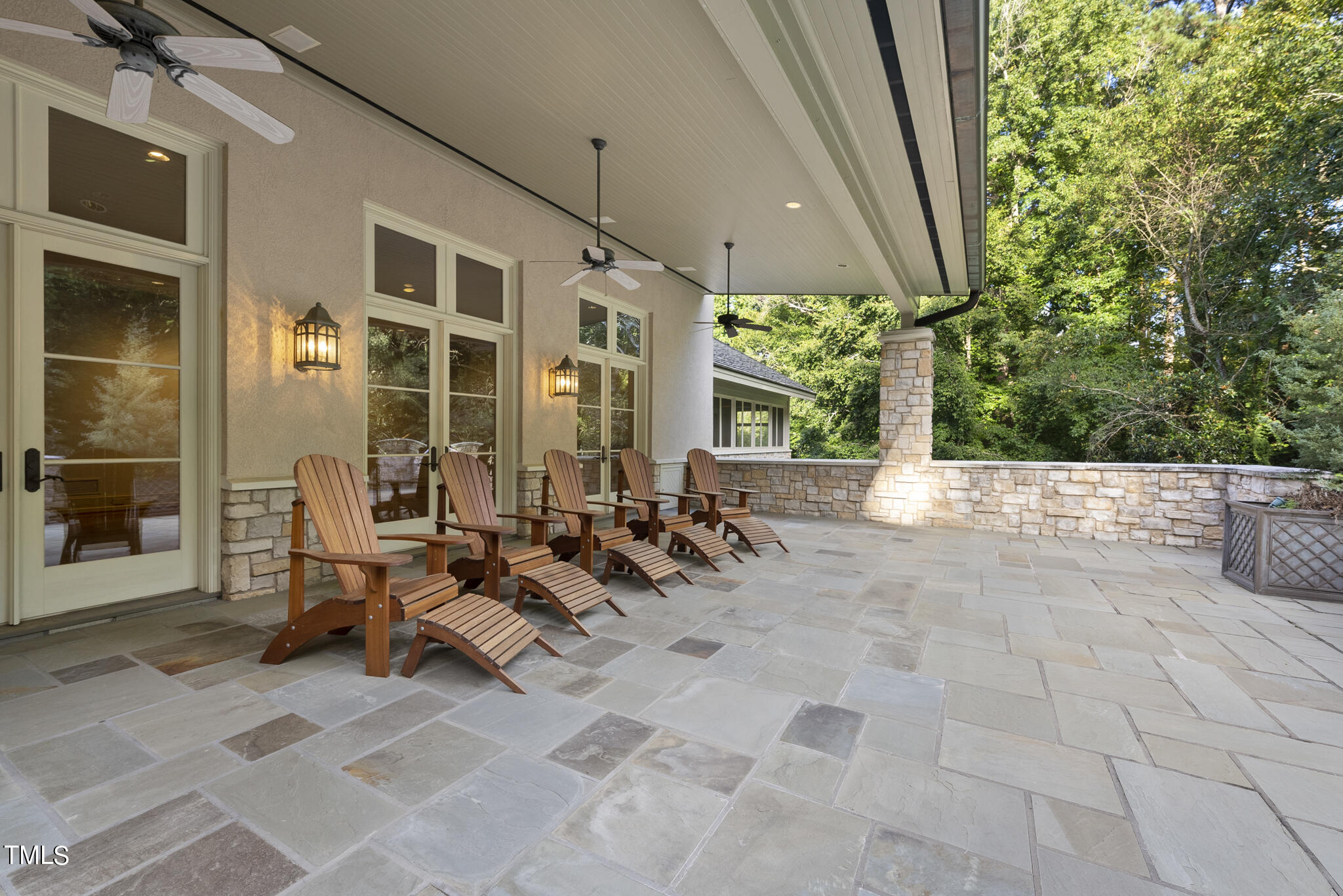 3319 White Oak Road Raleigh, NC 27609 - Photo 44 of 47 a view of a patio with table and chairs and potted plants