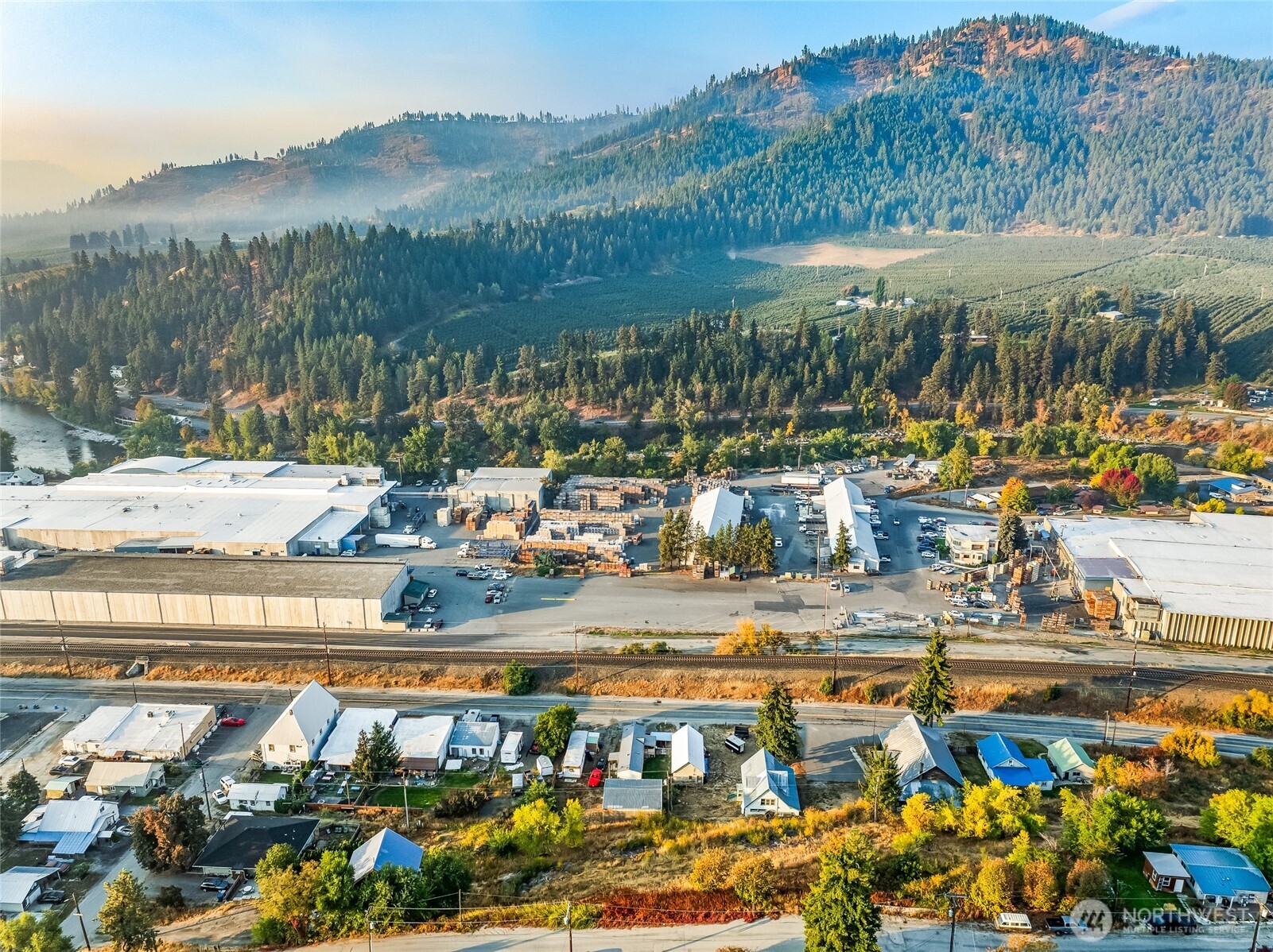 16 High Street Peshastin, WA 98847 - Photo 8 of 10 a view of a lake with a mountain and trees around
