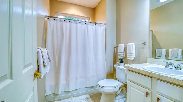 a view of garage with a wooden floor