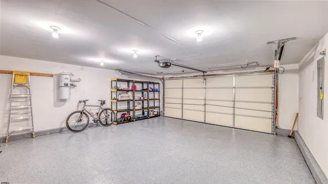 a front view of a house with outdoor seating