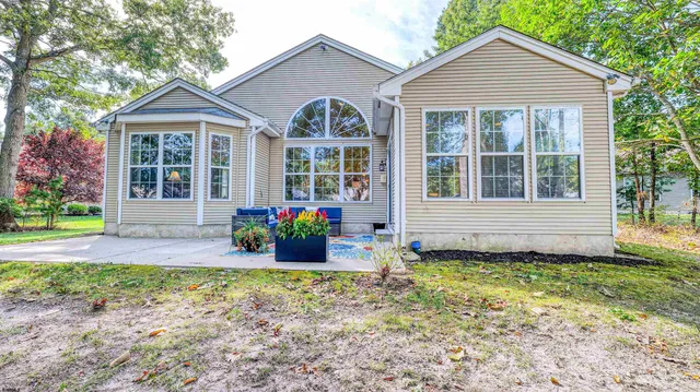 a outdoor living space with furniture and garden view