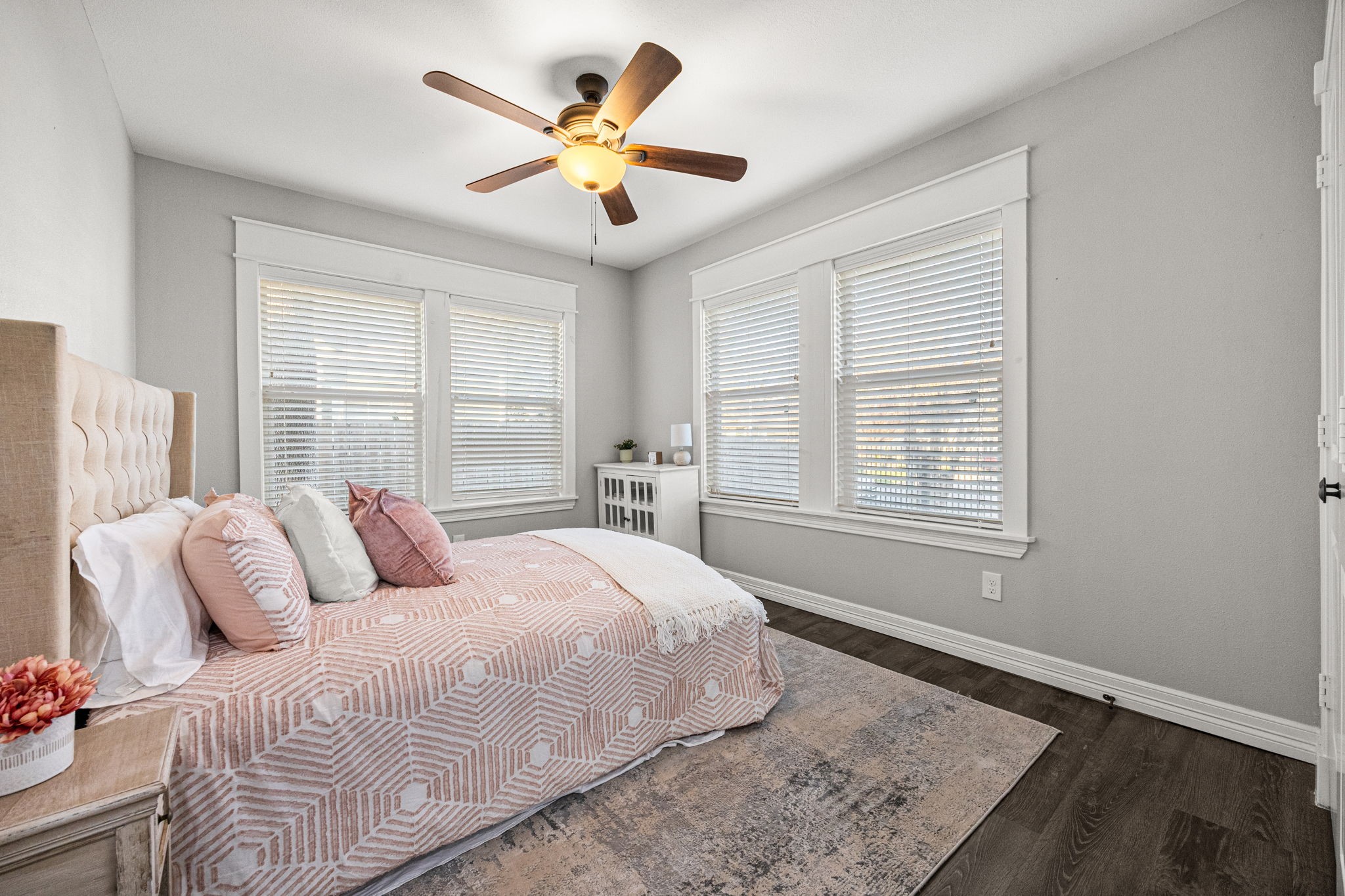 1405 Walton Street Houston, TX 77009 - Photo 20 of 28 Bright and inviting secondary bedroom with large windows, neutral palette, and ample space for guests or family.