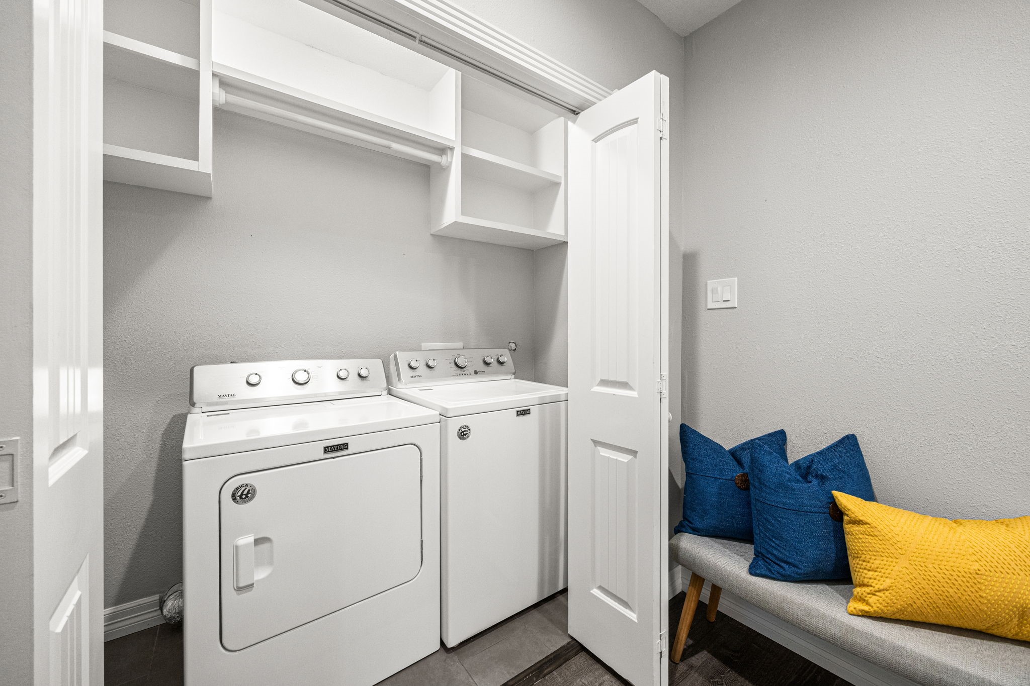 1405 Walton Street Houston, TX 77009 - Photo 24 of 28 Dedicated laundry space with upper shelving for storage and room for side-by-side washer and dryer, thoughtfully tucked away yet easily accessible.