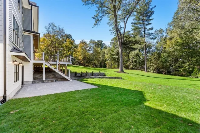 a view of yard with swimming pool