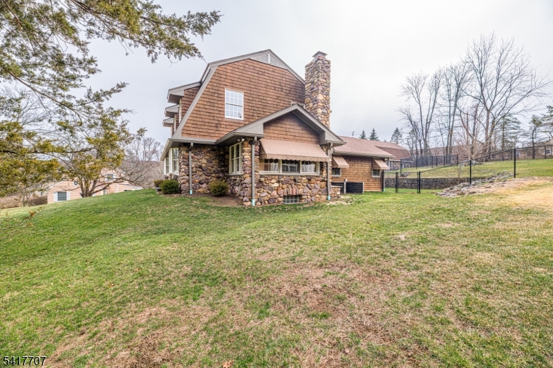 23 Old Denville Road Boonton, NJ 07005 - Photo 38 of 50 a front view of a house with garden