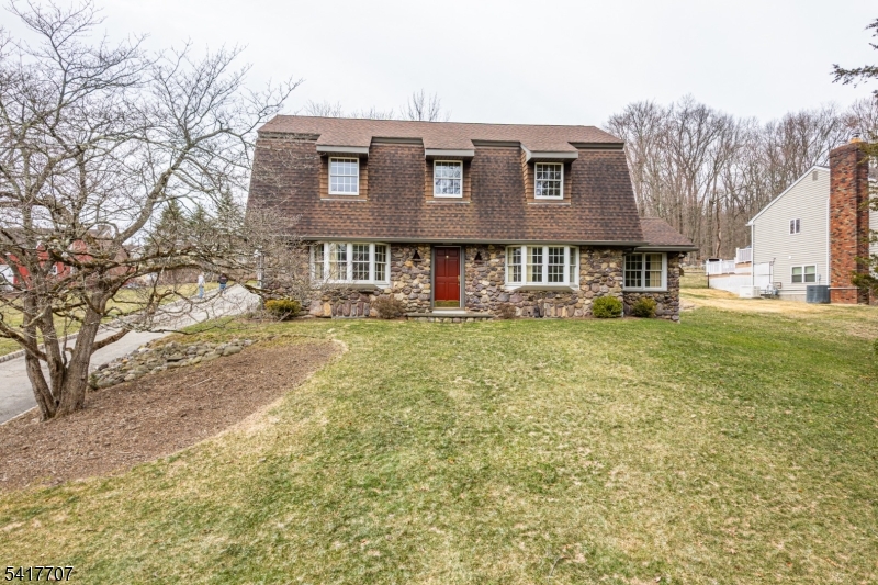 23 Old Denville Road Boonton, NJ 07005 - Photo 7 of 50 a front view of residential houses with yard and trees