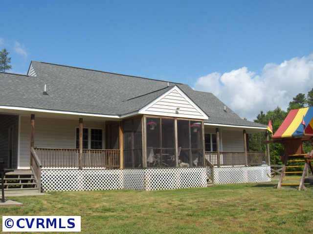17419 Fox Branch Road Carson, VA 23830 - Photo 10 of 10 a front view of a house with a garden