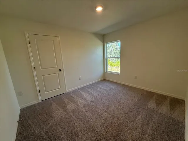 a view of empty room with window