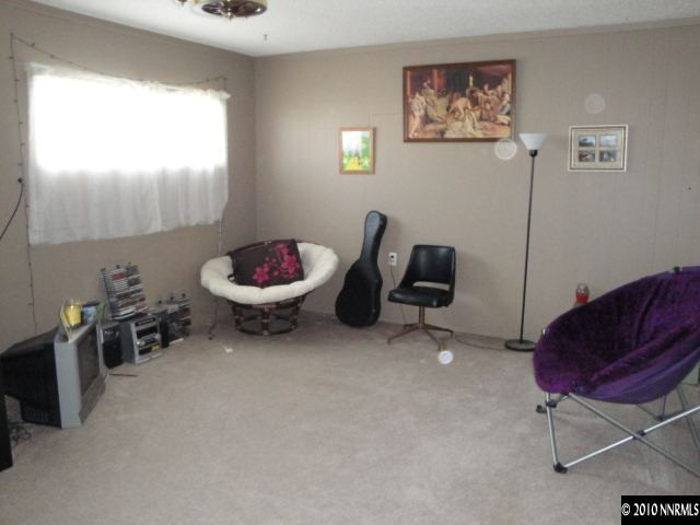3370 Rauscher Drive Reno, NV 89503 - Photo 5 of 9 a living room with furniture and a chair