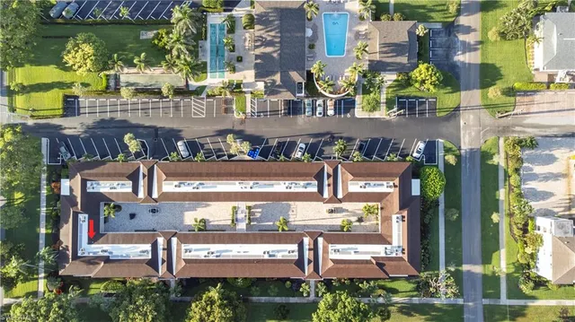 an aerial view of a building with outdoor space