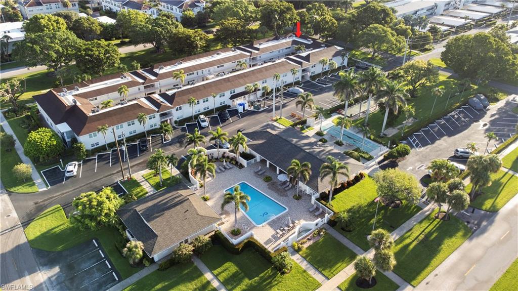 578 Broad Avenue South, Unit 578 Naples, FL 34102 - Photo 31 of 32 an aerial view of a building with outdoor space