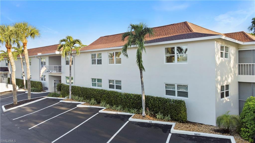 578 Broad Avenue South, Unit 578 Naples, FL 34102 - Photo 32 of 32 a view of a house with a patio