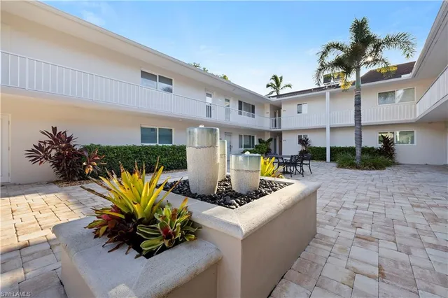 a front view of a house with patio