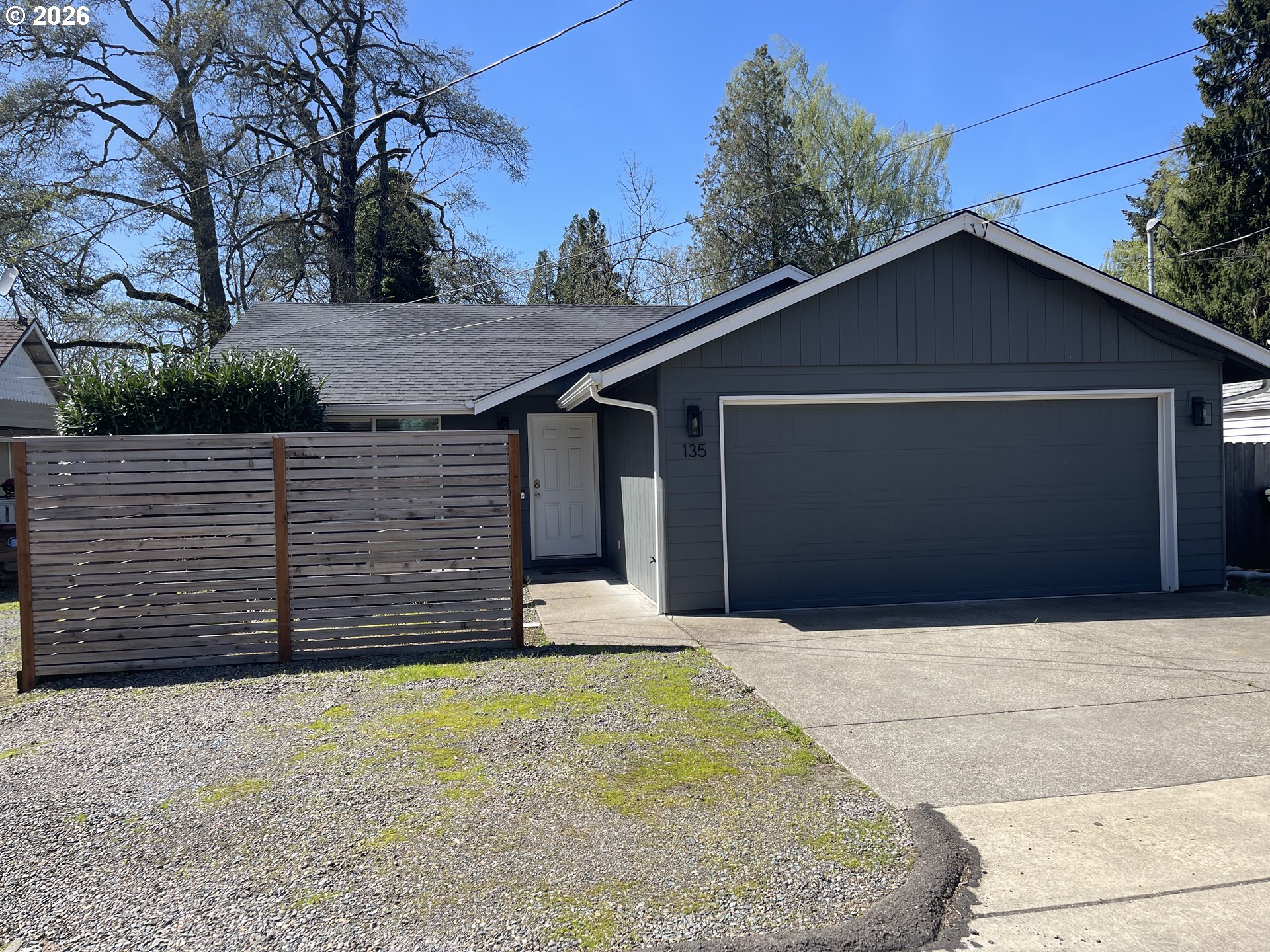 135 Wander Way Southeast Salem, OR 97301 - Photo 1 of 36 a view of backyard of house and garage