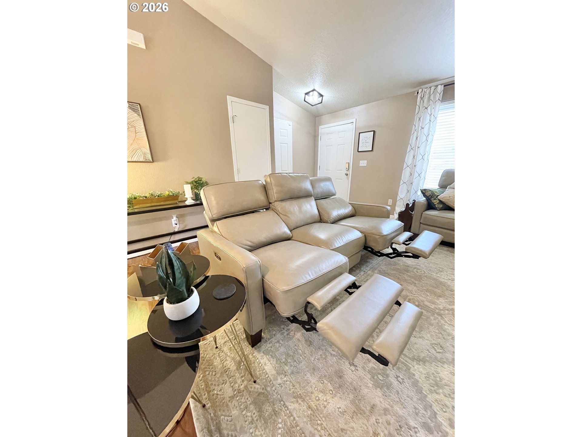 135 Wander Way Southeast Salem, OR 97301 - Photo 7 of 36 a living room with furniture and a rug