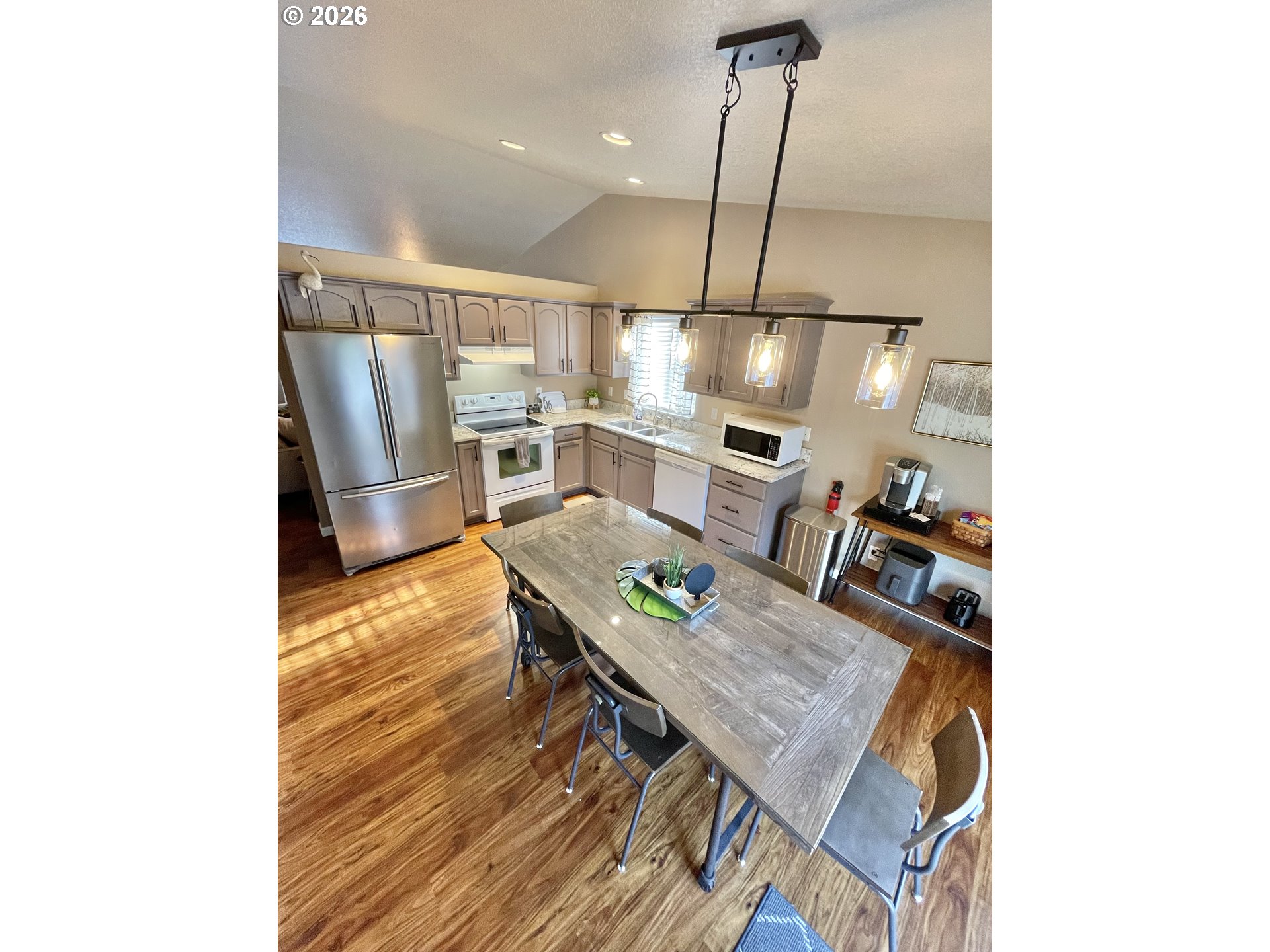 135 Wander Way Southeast Salem, OR 97301 - Photo 10 of 36 a living room with furniture and wooden floor