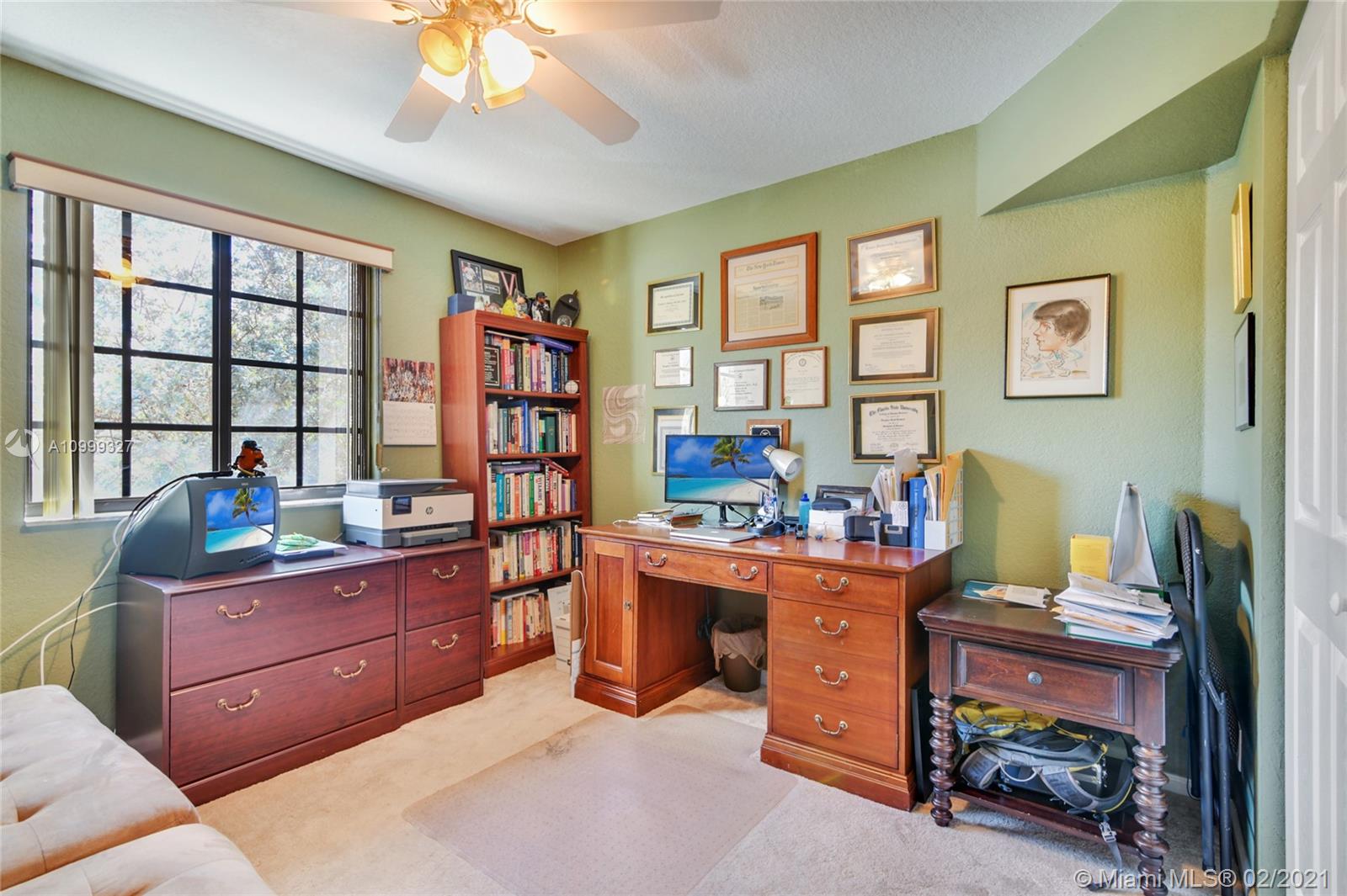 4100 Forest Drive, Unit 4100 Weston, FL 33332 - Photo 13 of 14 a room with a desk and workspace