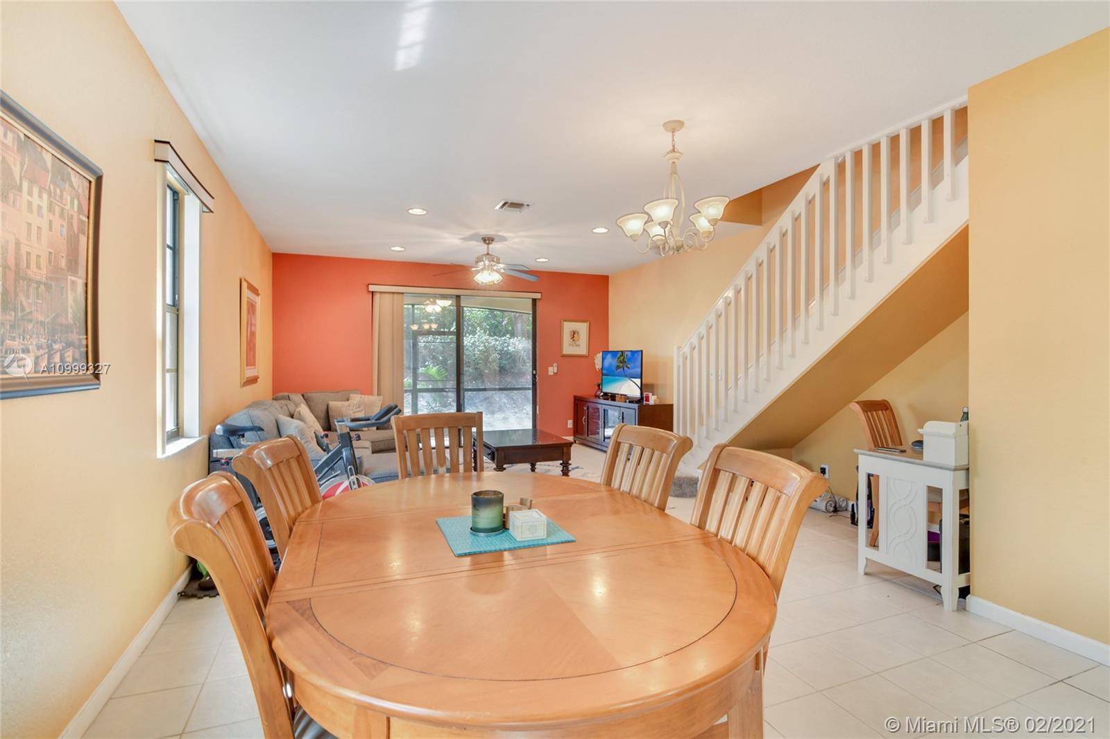 4100 Forest Drive, Unit 4100 Weston, FL 33332 - Photo 5 of 14 a view of a dining room with furniture window and wooden floor