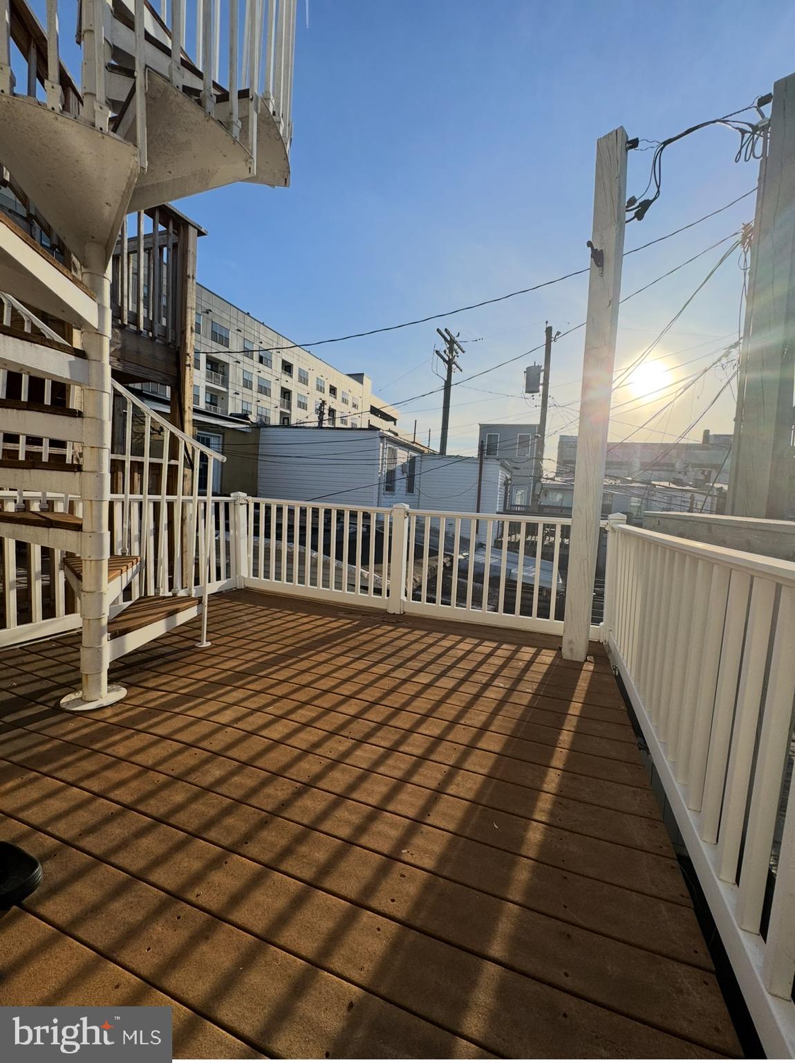 1746 South Hanover Street Baltimore, MD 21230 - Photo 14 of 19 a view of balcony with wooden floor