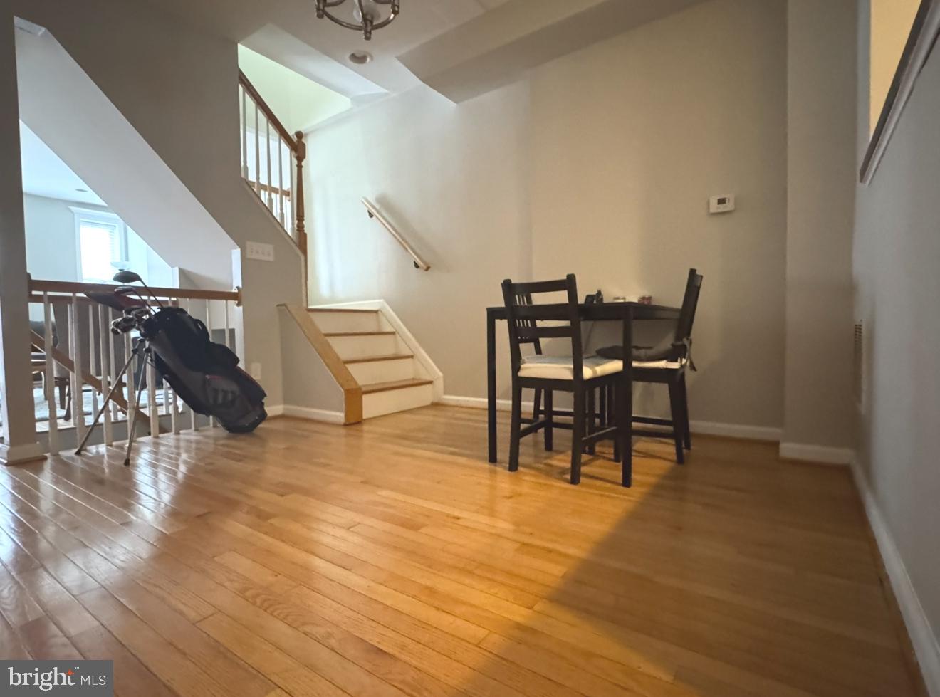 1746 South Hanover Street Baltimore, MD 21230 - Photo 7 of 19 a view of a dining room with furniture and wooden floor