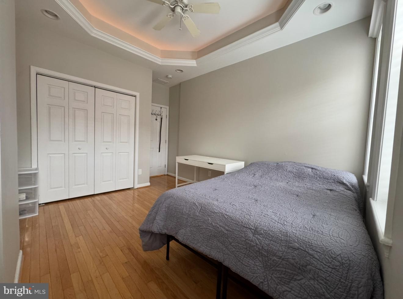 1746 South Hanover Street Baltimore, MD 21230 - Photo 9 of 19 a bedroom with a bed and a table