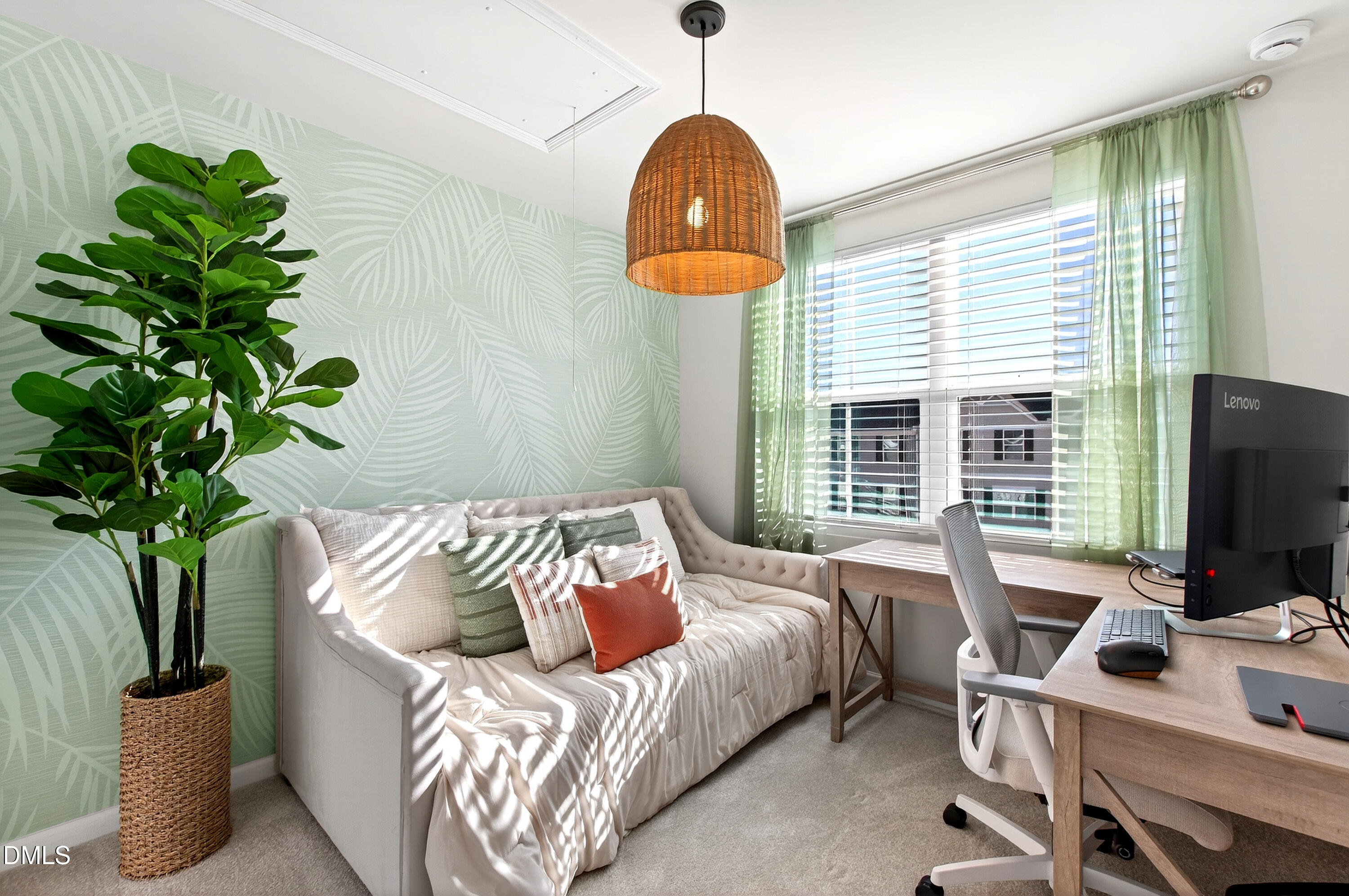 4629 Great Egret Way Raleigh, NC 27616 - Photo 23 of 48 a bed sitting in a bedroom next to a window with potted plant