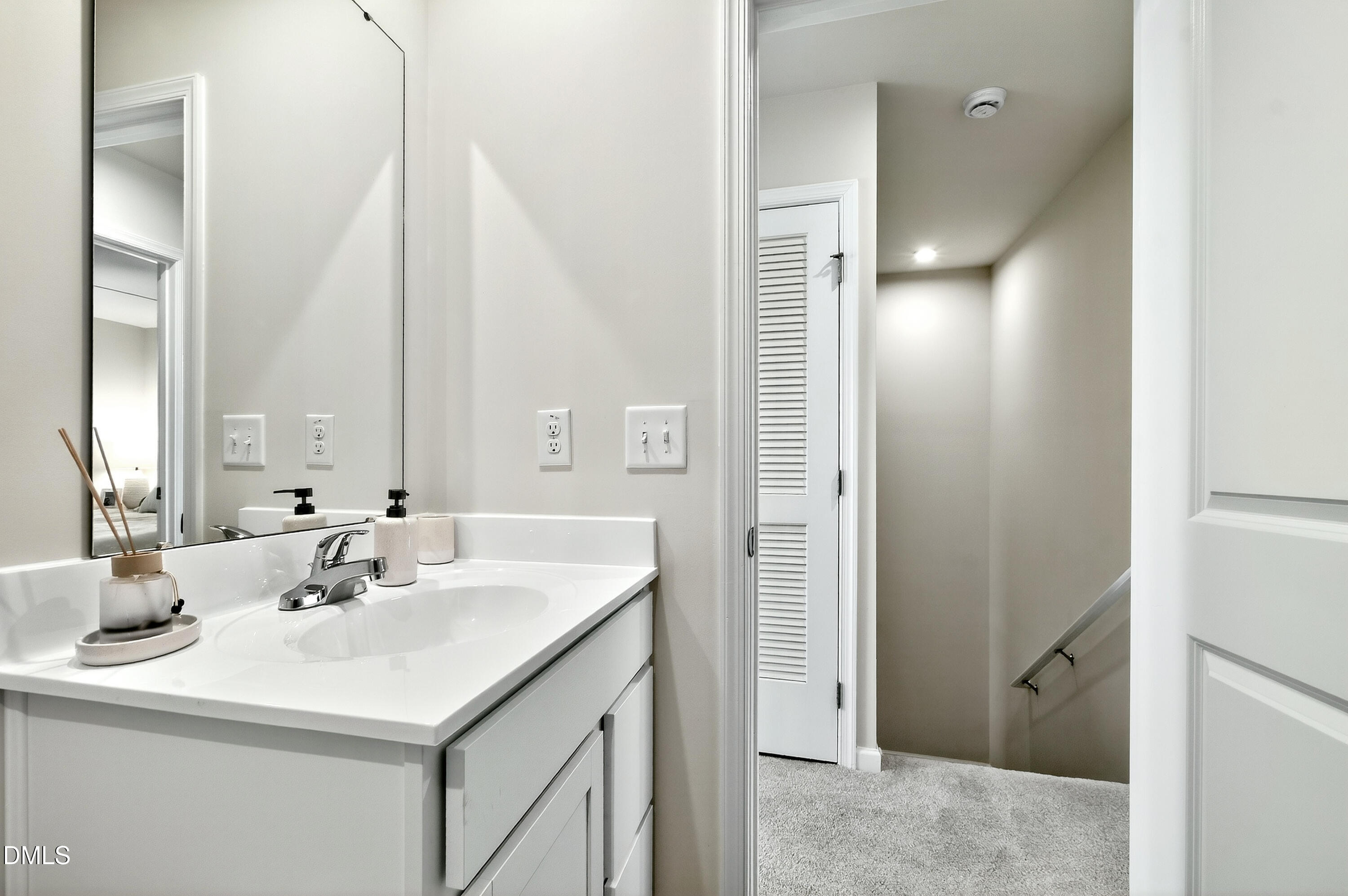4629 Great Egret Way Raleigh, NC 27616 - Photo 26 of 48 a bathroom with a sink and a mirror