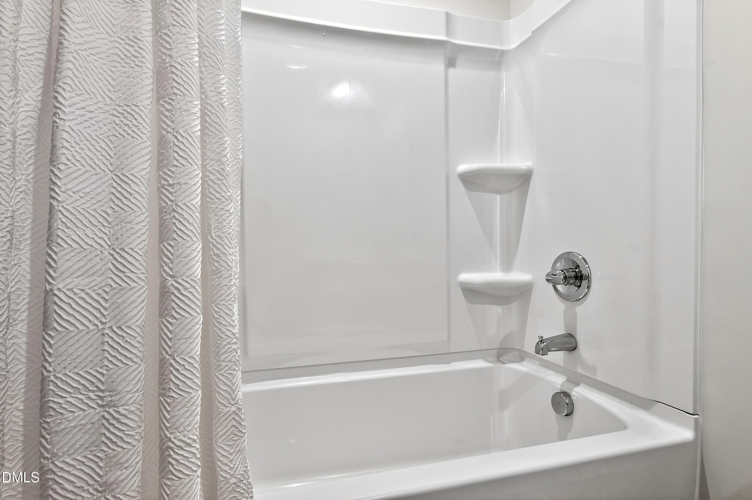 4629 Great Egret Way Raleigh, NC 27616 - Photo 27 of 48 a close view of a bathtub in bathroom