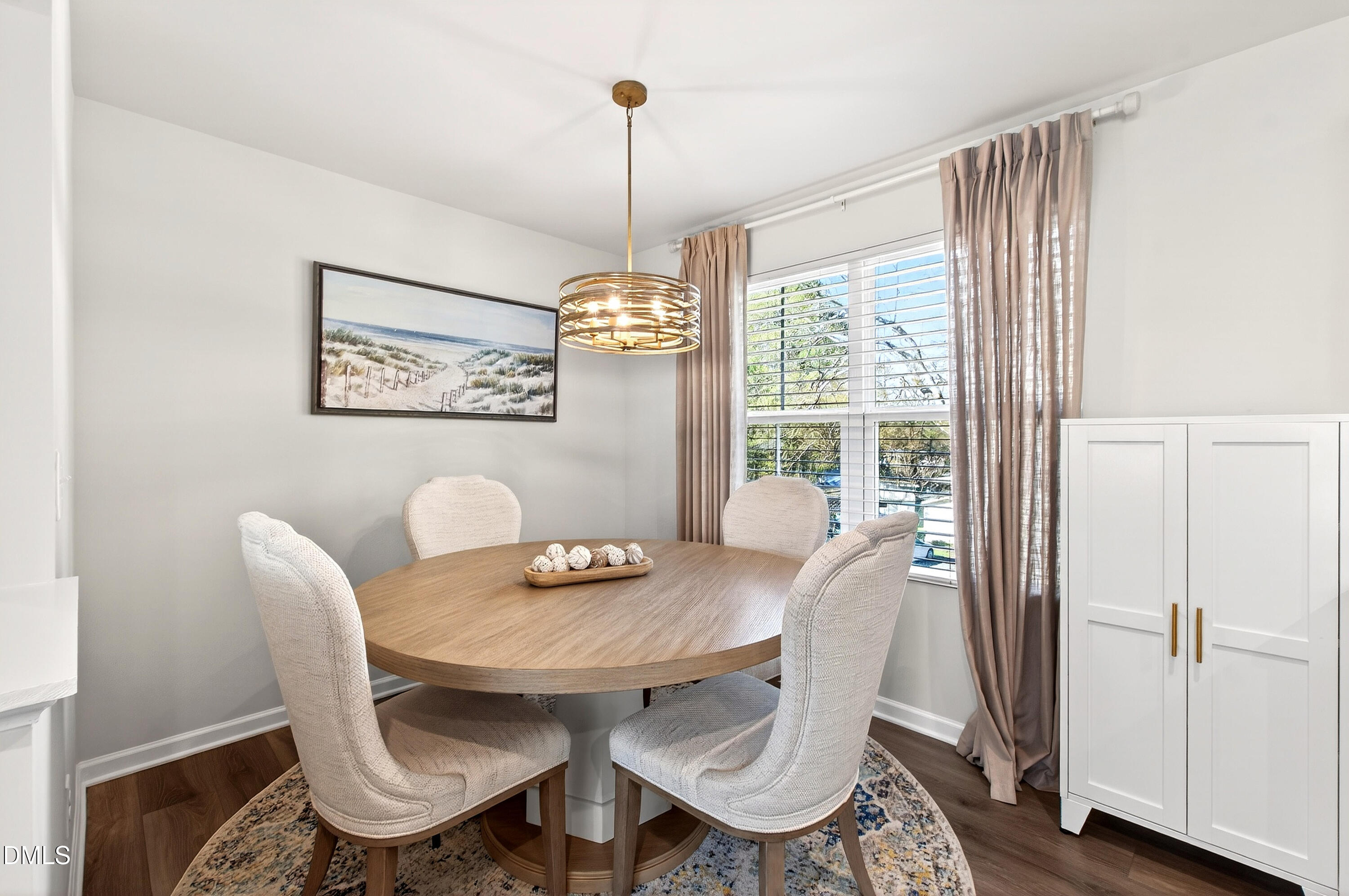 4629 Great Egret Way Raleigh, NC 27616 - Photo 3 of 48 a view of a dining room with furniture window and wooden floor