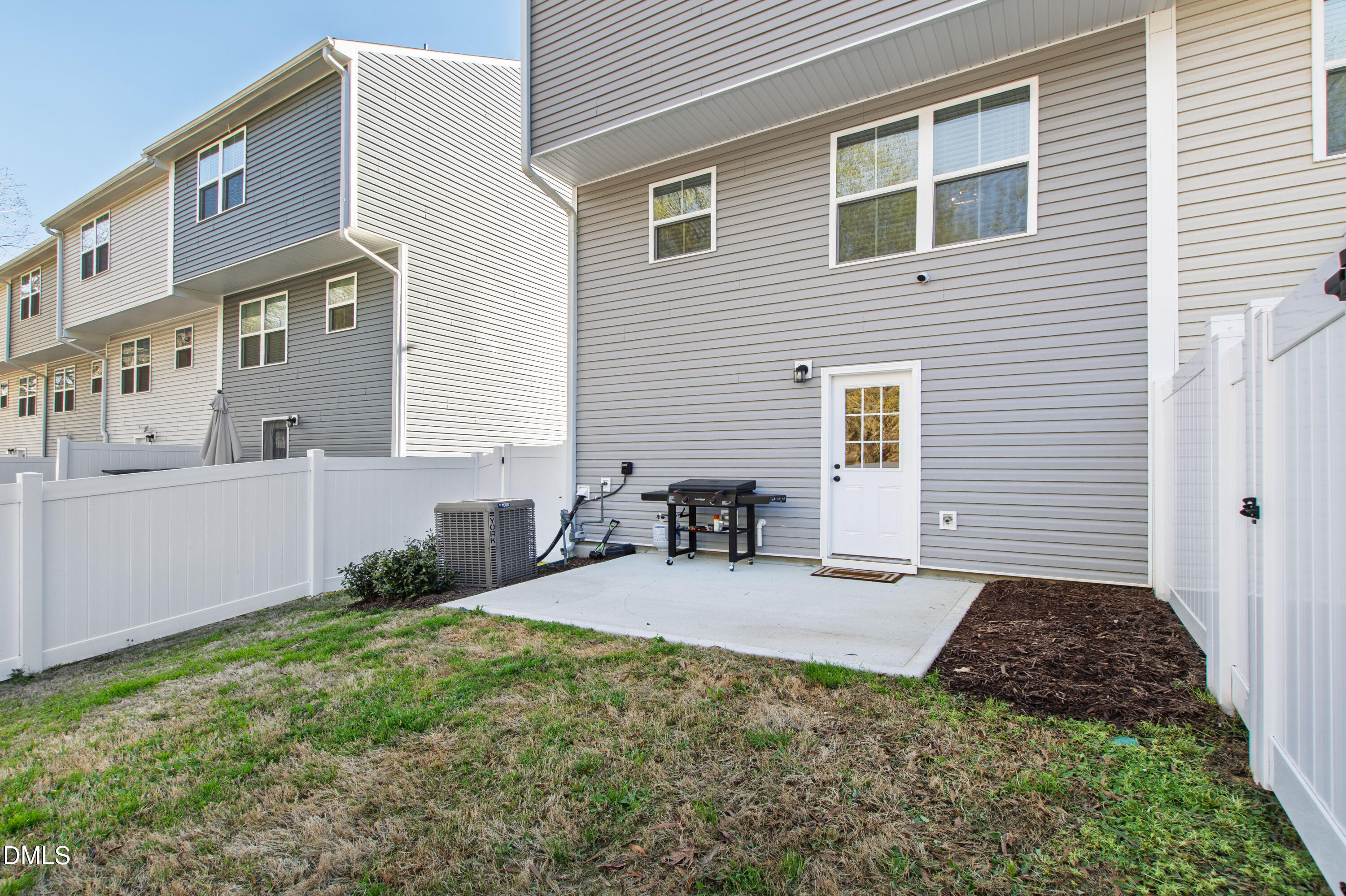 4629 Great Egret Way Raleigh, NC 27616 - Photo 4 of 48 a backyard of a house with table and chairs