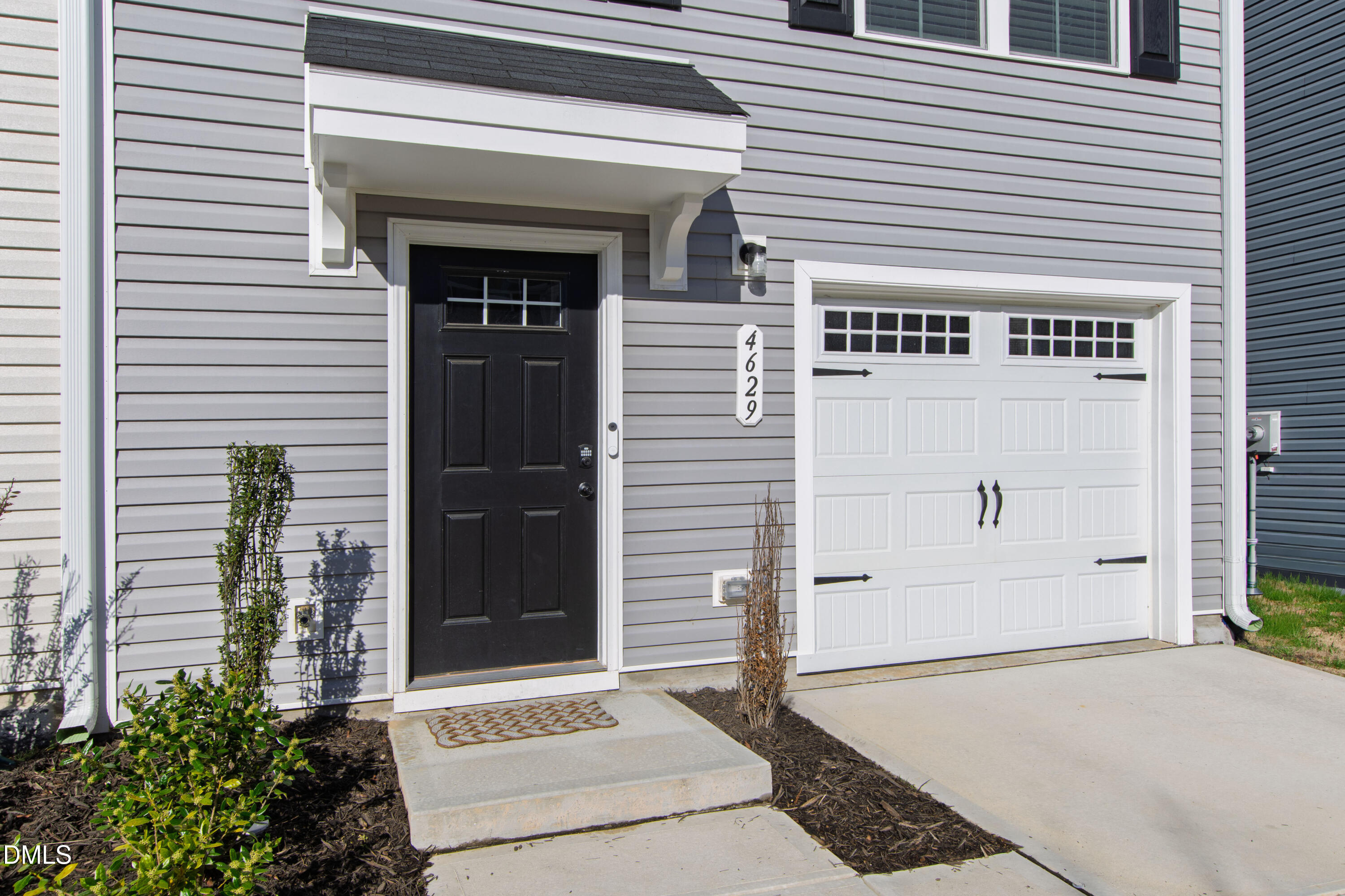 4629 Great Egret Way Raleigh, NC 27616 - Photo 6 of 48 a front view of a house with a garage
