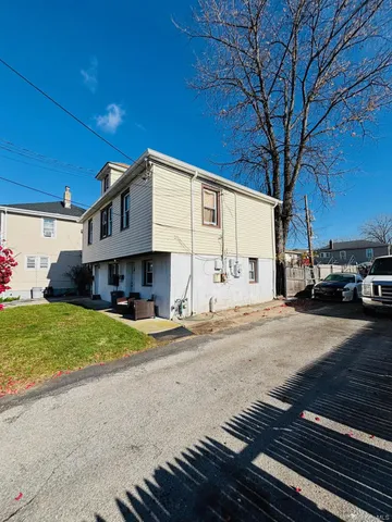 a view of a building with a street