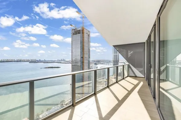 a view of staircase with a floor to ceiling window