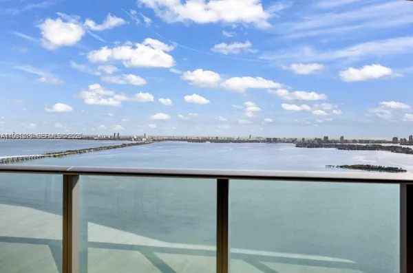 a view of a hallway with closet area
