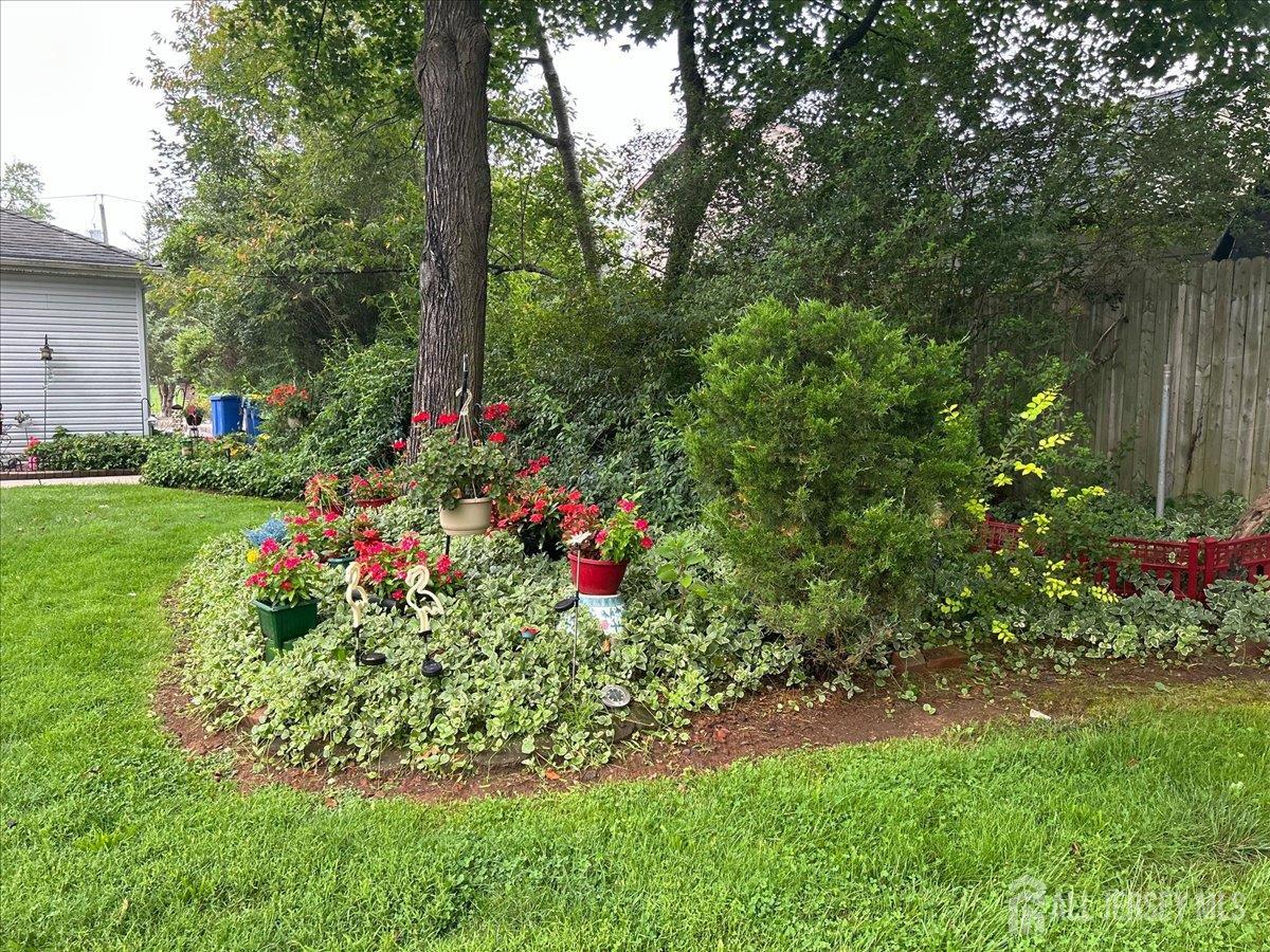 33 Ellison Road Somerset, NJ 08873 - Photo 27 of 38 a view of a flower in a yard with swimming pool