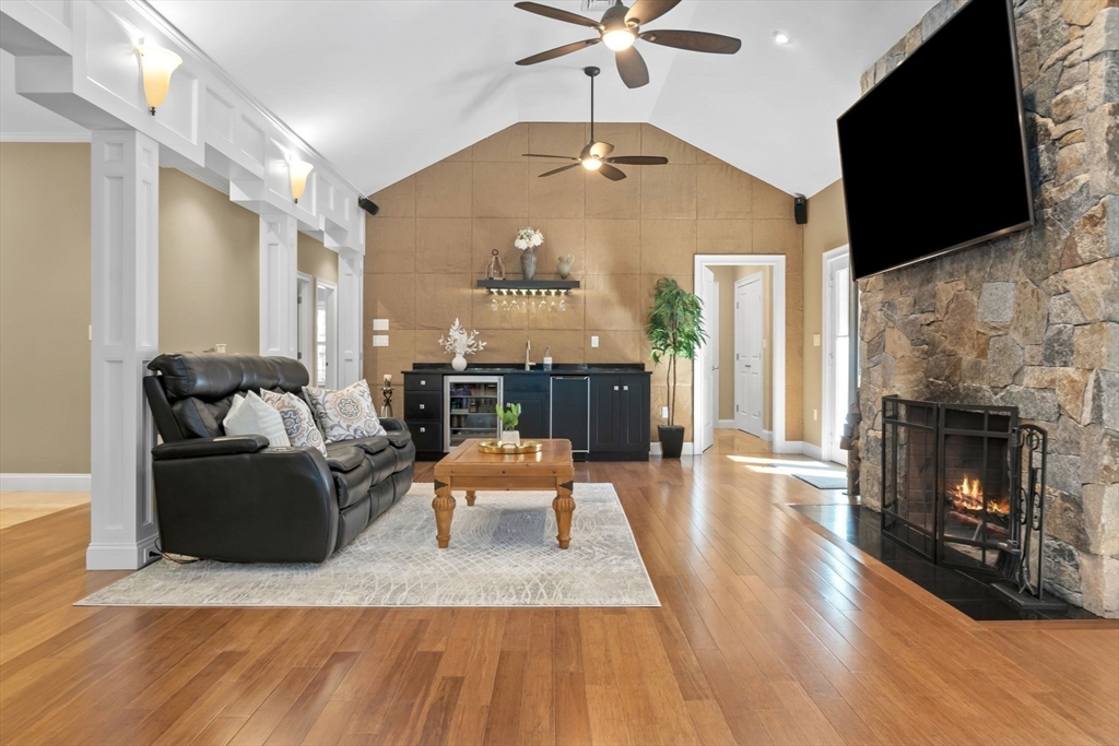10 Pine Plain Road Georgetown, MA 01833 - Photo 11 of 42 a living room with furniture fireplace and flat screen tv