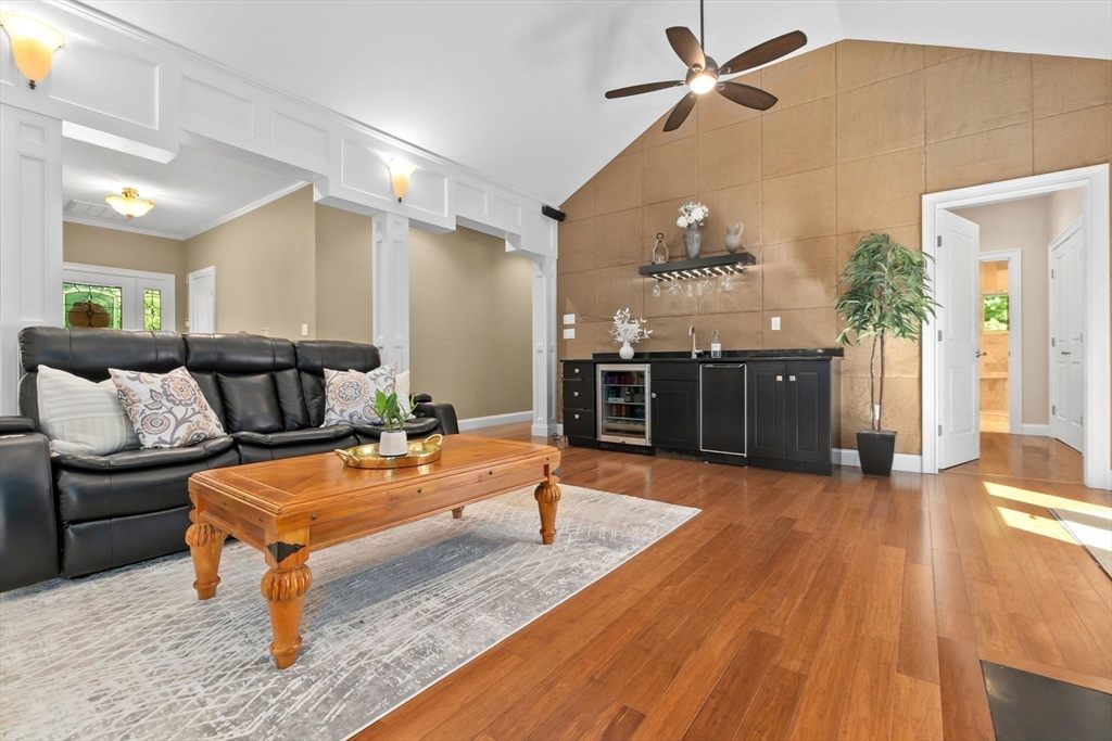 10 Pine Plain Road Georgetown, MA 01833 - Photo 12 of 42 a living room with furniture a dining table and kitchen view