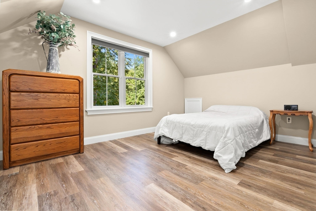 10 Pine Plain Road Georgetown, MA 01833 - Photo 34 of 42 a bedroom with a bed and a dresser