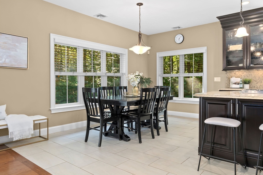 10 Pine Plain Road Georgetown, MA 01833 - Photo 7 of 42 a view of a dining room with furniture window and outside view