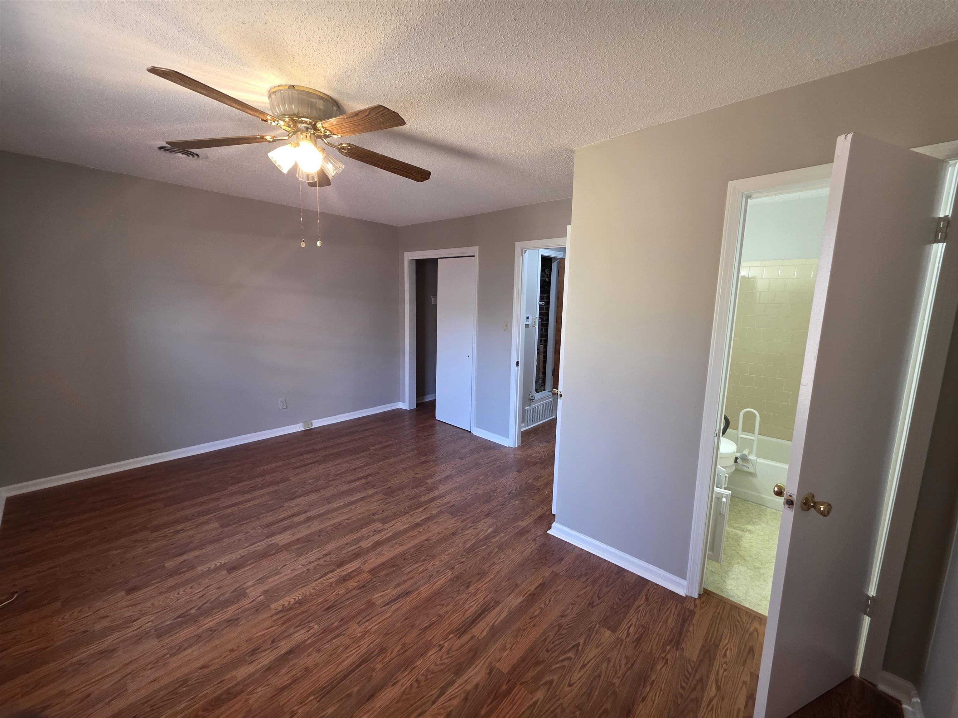 1404 Cameron Street Memphis, TN 38106 - Photo 25 of 37 wooden floor in an empty room with a mirror