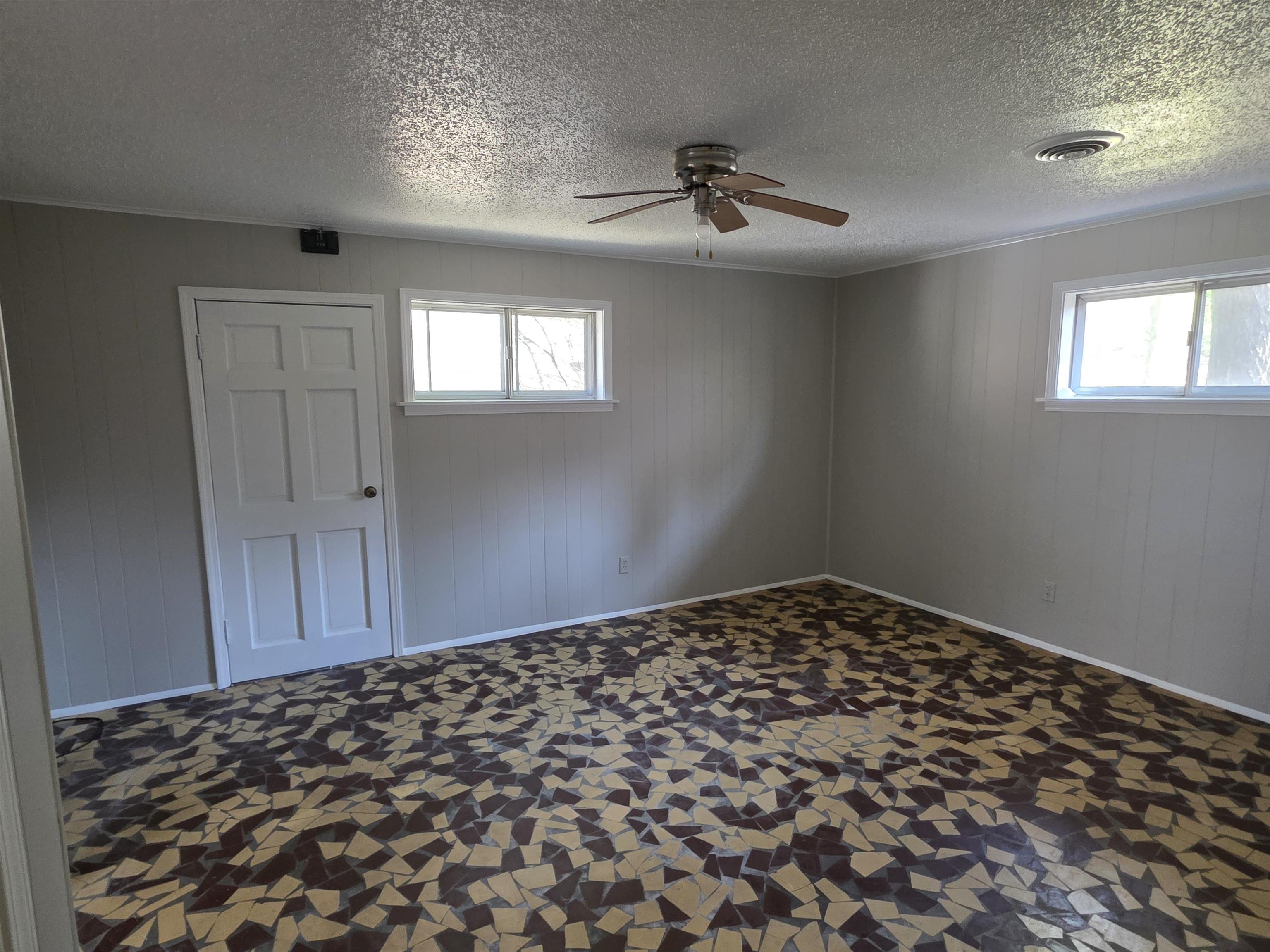 1404 Cameron Street Memphis, TN 38106 - Photo 26 of 37 a large bedroom with a bed