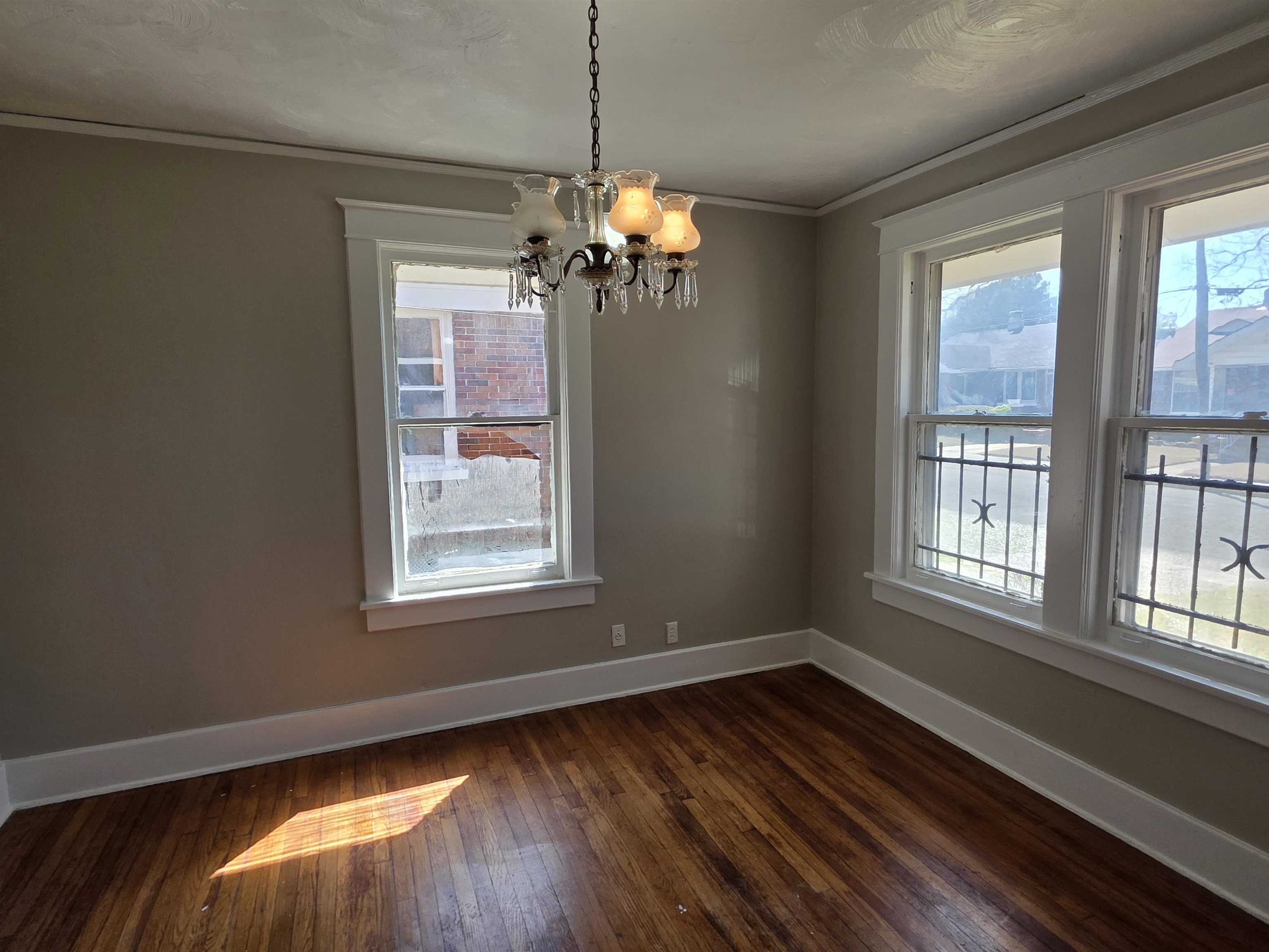 1404 Cameron Street Memphis, TN 38106 - Photo 32 of 37 a view of a room with window wooden floor and windows