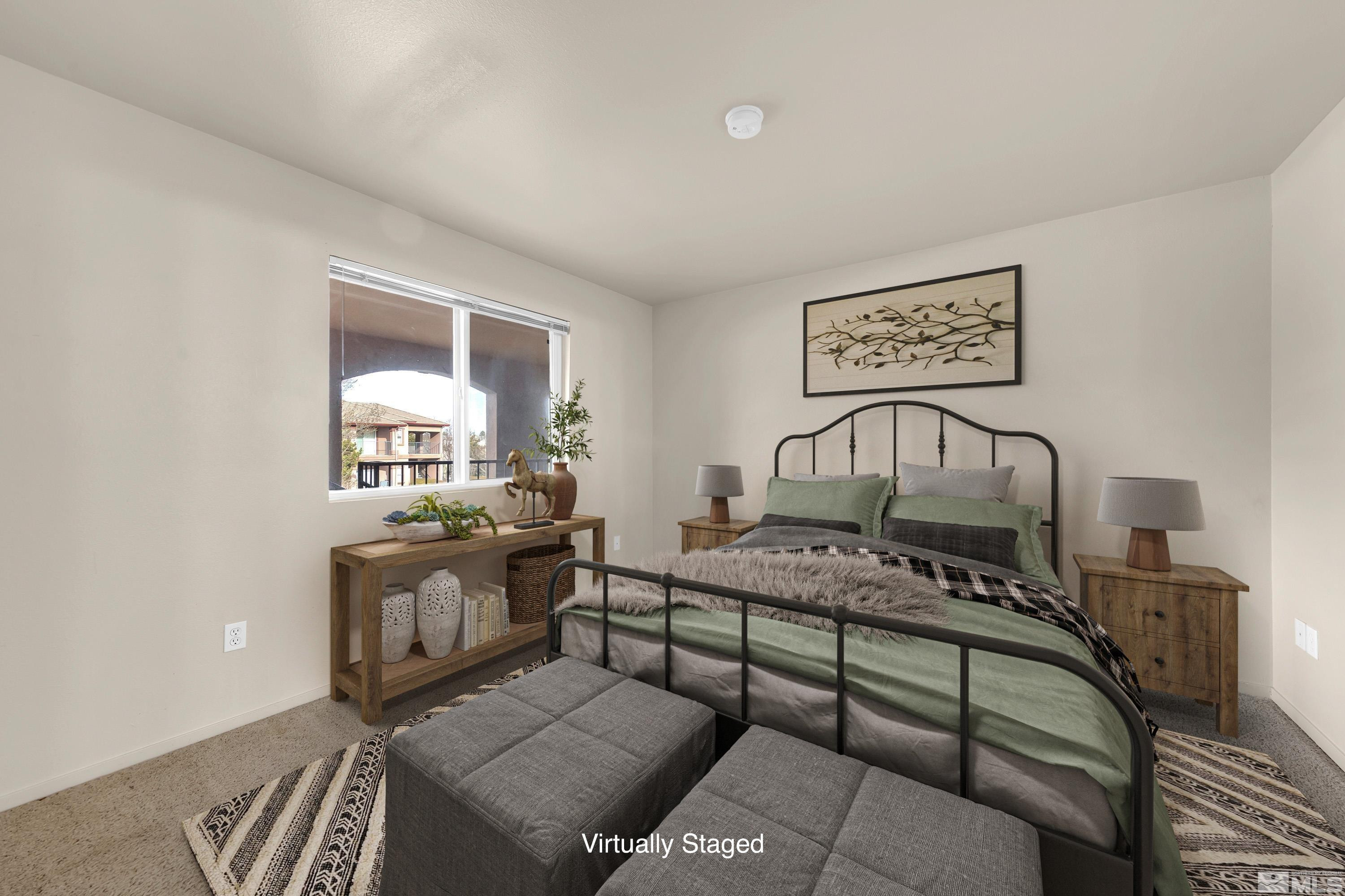 6850 Sharlands Avenue, Unit 2120 Reno, NV 89523 - Photo 12 of 35 a bedroom with furniture and a window