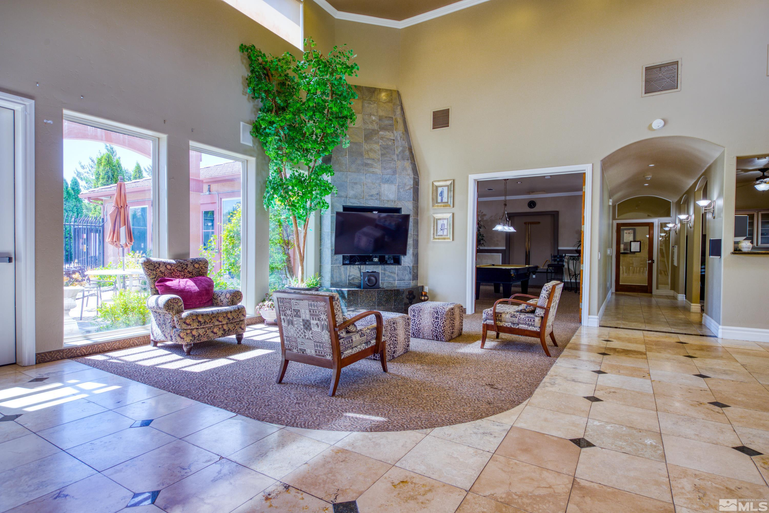 6850 Sharlands Avenue, Unit 2120 Reno, NV 89523 - Photo 26 of 35 a living room filled with furniture