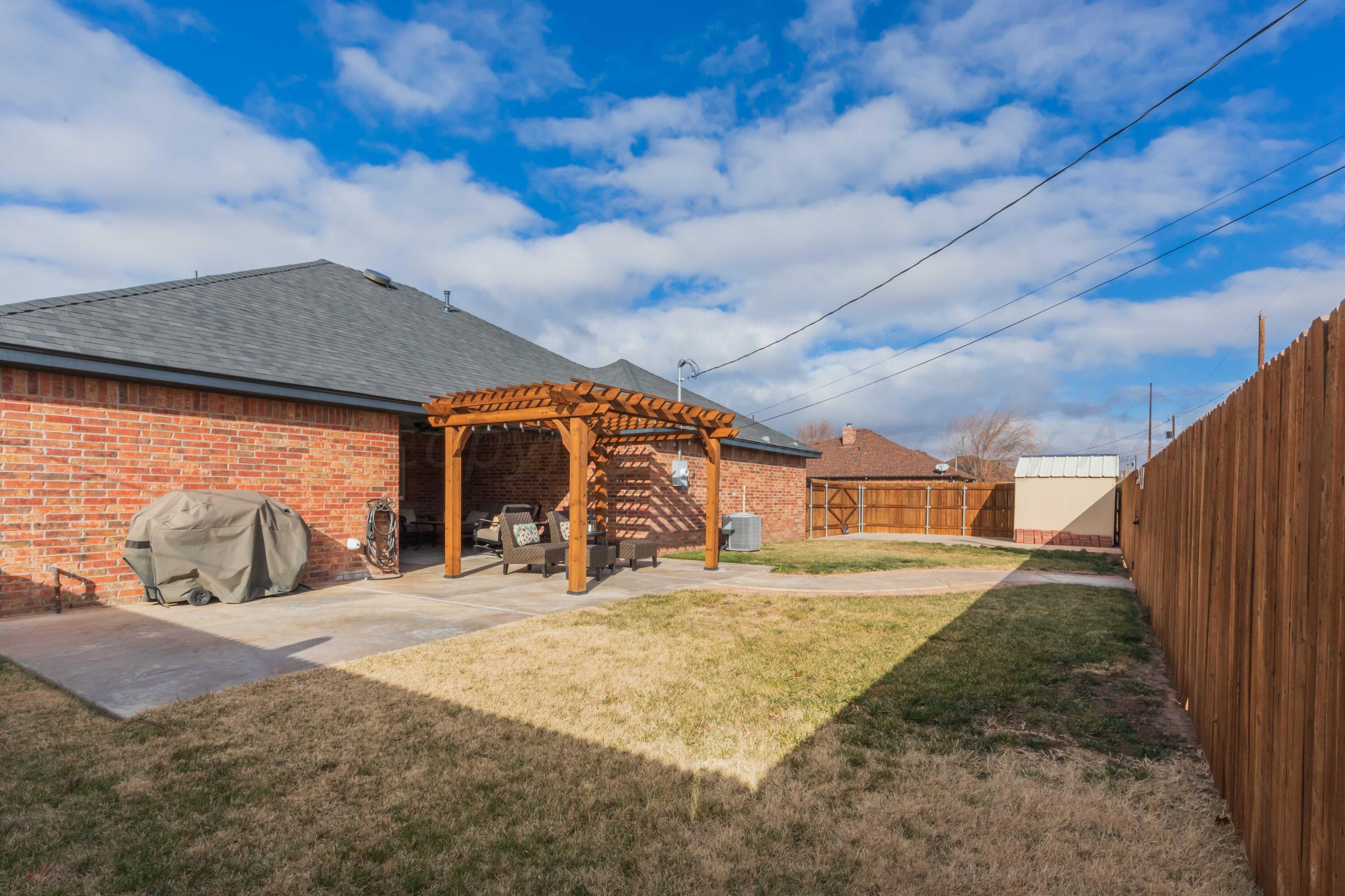 5901 South Rusk Street Amarillo, TX 79118 - Photo 4 of 53 BACKYARD VIEW 1
