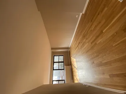 a view of a room that has a window